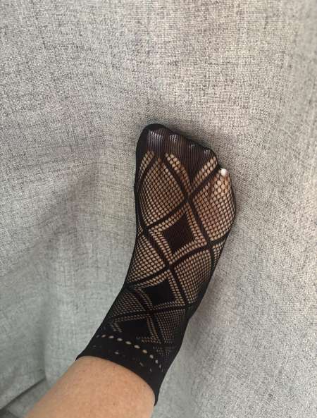 Femme pour fétichiste des pieds